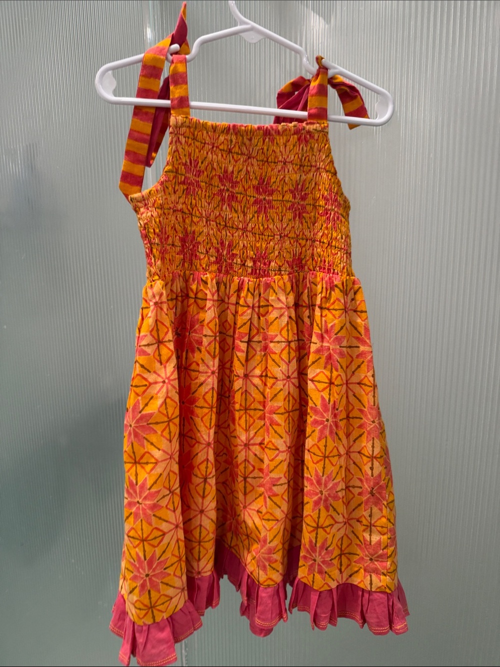 fabindia Orange and Pink Floral Smocked Sundress for Kids